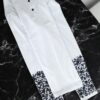 Pureza y Estilo: Playera Blanca de Manga Larga para Caballero Bordada a Mano - Imagen 10